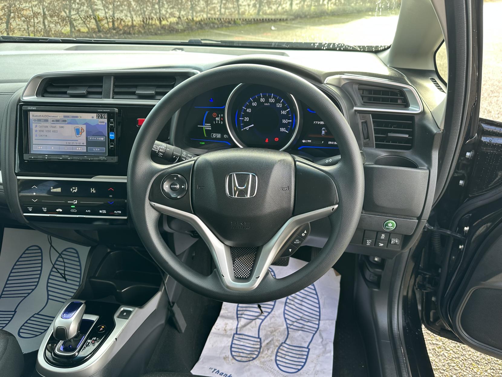 Honda Fit 1.5 2015 HONDA FIT 1.5 Automatic Petrol Hybrid Black 5dr